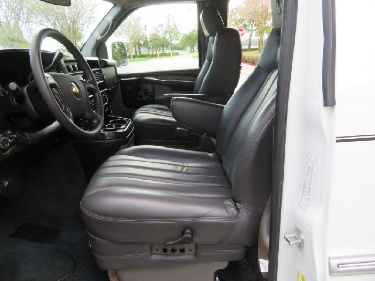 2010 White /Gray Chevrolet Express (1GNUGCD48A1) , located at 4301 Oak Circle #19, Boca Raton, FL, 33431, (954) 561-2499, 26.388861, -80.084038 - You are looking at a Gorgeous 2010 Chevy Express Handicap Wheelchair Conversion Van Explorer Limited SE with 31K Original Miles, Braun Century 750lb Side Entry Wheelchair lift, Tie Down System in the Floor, Rear Entertainment with Flat Screen TV/DVD, Leather Interior, Rear Power Folding Bench Seat/b - Photo#76